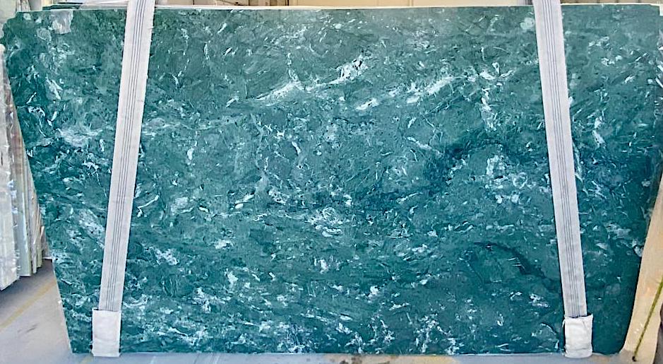 Slab of alpine green Verde Alpi marble currently available.