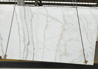 Calacatta oro marble slab currently available.